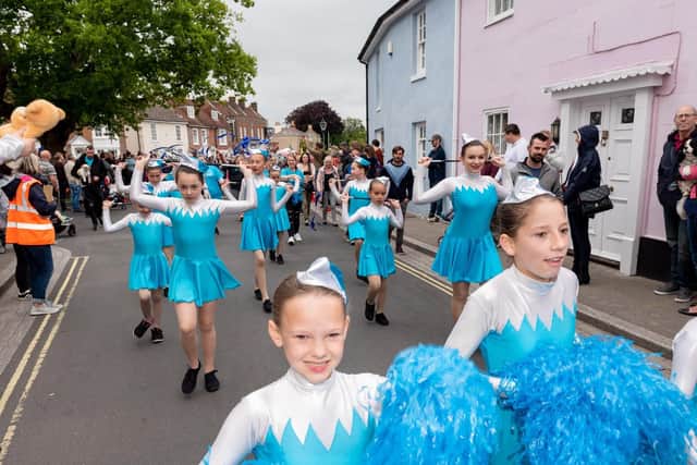 The carnival parade processes through the streets of Portchester to Portchester Castle. Picture: Vernon Nash (150619-035)