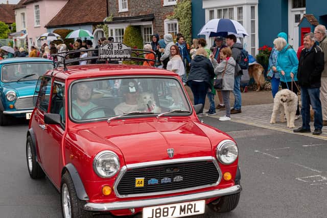 The carnival parade processes through the streets of Portchester to Portchester Castle. Picture: Vernon Nash (150619-050)