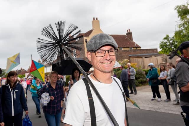 The carnival parade processes through the streets of Portchester to Portchester Castle. Picture: Vernon Nash (150619-043)