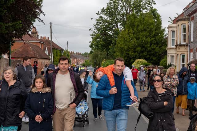 The carnival parade processes through the streets of Portchester to Portchester Castle. Picture: Vernon Nash (150619-054)