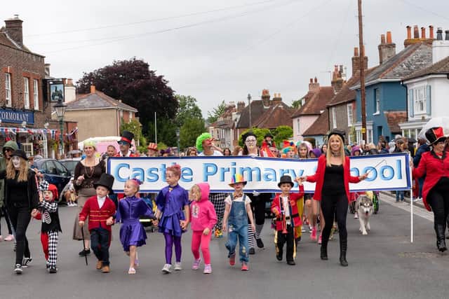 The carnival parade processes through the streets of Portchester to Portchester Castle. Picture: Vernon Nash (150619-044)
