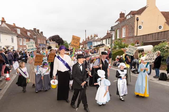 The carnival parade processes through the streets of Portchester to Portchester Castle. Picture: Vernon Nash (150619-040)