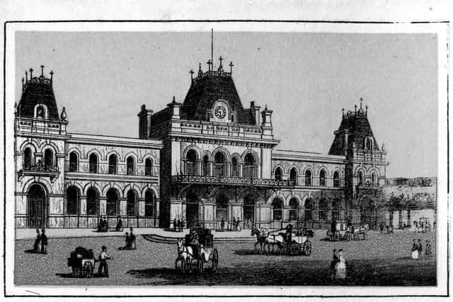 Horse drawn cabs outside Portsmouth railway Station.