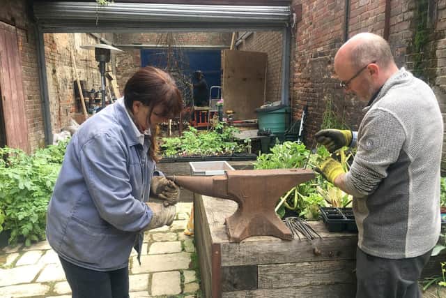 Paula Ann Savage and Ben O'Brian making the little fish