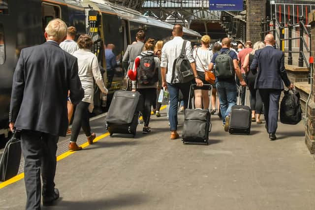 Train passengers getting off at their stop. Picture: Shutterstock