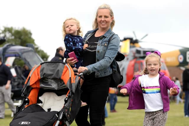 Charlotte Ottewill and her daughters, Harpur, 2, left, and Mollie, 5. HMS Sultan Summer Show 2019, Gosport. Picture: Chris Moorhouse (160619-46)