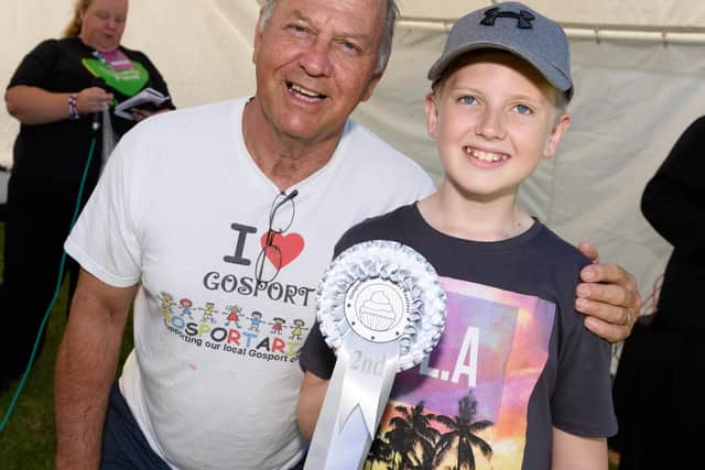(L-R) Malcolm Dent (Chair, Gosportarians), Josh Tribbeck (12) placed 2nd in the 'Shortbread' category. Picture: Duncan Shepherd