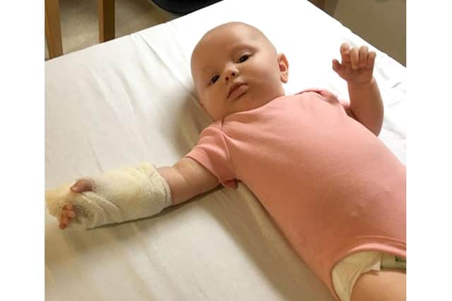 Harper Spencer while in hospital with meningitis