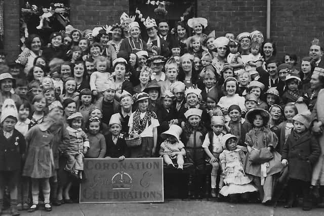 I am just hoping someone still survives from this 1937 photograph of residents and children in a Portsmouth street celebrating the coronation of George VI.