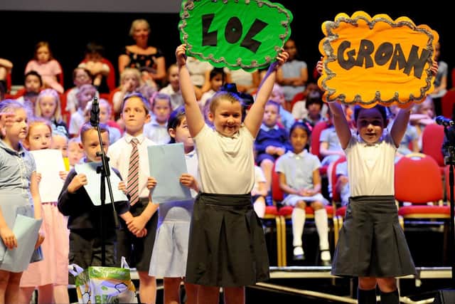 Portsmouth Schools' Infant Choir, practice in readiness for their evening performance.
Picture: Sarah Standing (270619-9774)