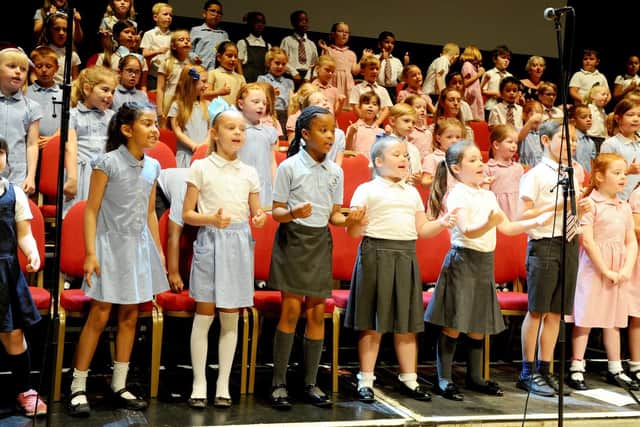 Portsmouth Schools' Infant Choir get to experience what it is like to perform on the Guildhall stage.
Picture: Sarah Standing (270619-1706)