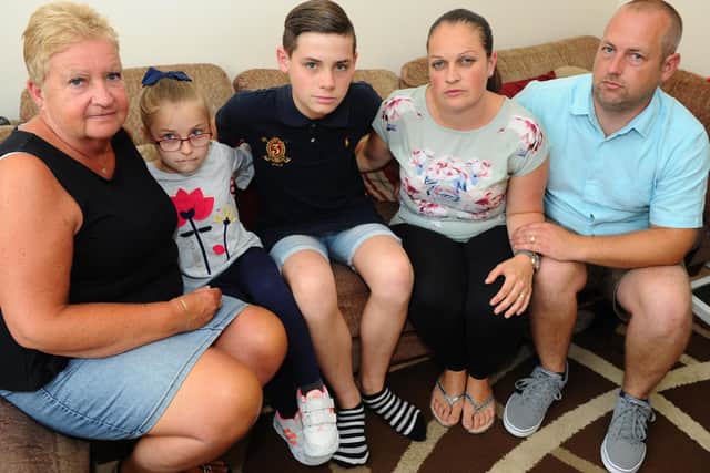 (l-r) Shelley-Ria's mum Sandra Porter (59), Millie Dickens (8), George Porter-Savage (14), Shelley-Ria Dickens (37) and Steve Dickens (37) who all went on the holiday.
Picture: Sarah Standing (240619-1600)
