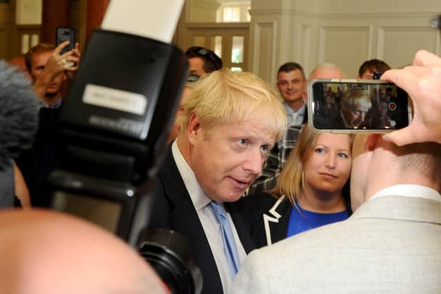 Boris Johnson speaking to the press during his visit in Portsmouth today 
Picture: Sarah Standing (270619-1827)