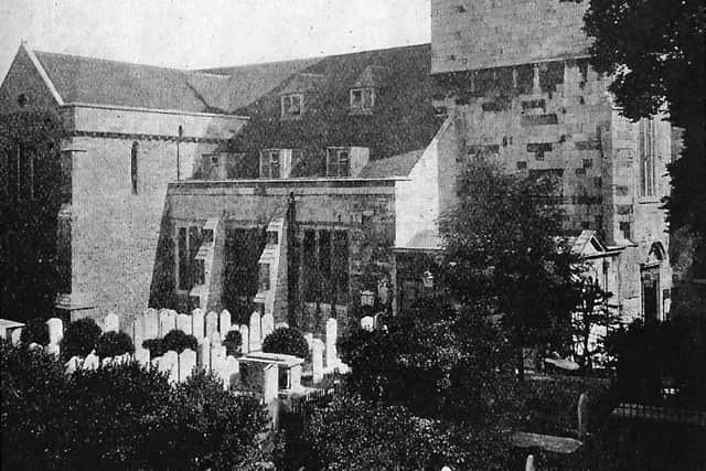 Taken from St Thomass Street, Old Portsmouth,  we see what is now the Anglican cathedral when there were many headstones in the churchyard.