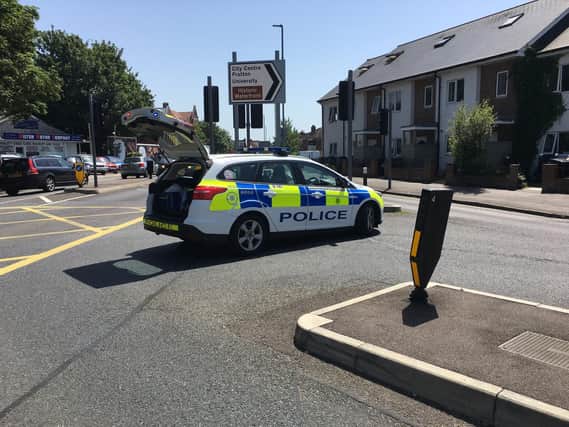 Police in Milton Road. Picture: James Butler
