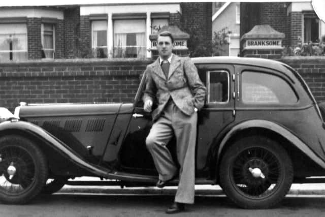 Posing in front of his classic sports car is Cecil Humby. Can anyone recognise the car or the house?