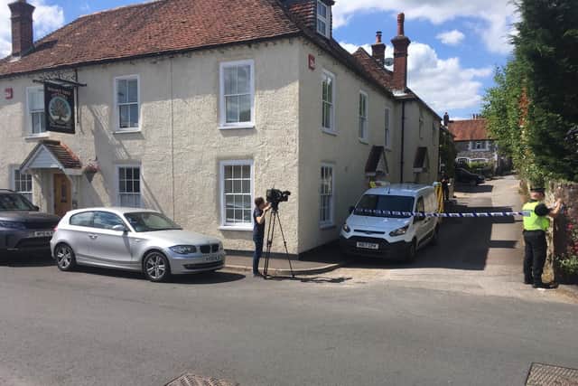 The scene from Vicarage Lane in Hambledon after a murder July 2, 2019