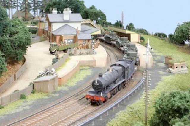 No, not an aerial photograph but a marvellous model railway of Rowlands Castle during the Second World War with a train of tanks passing through.