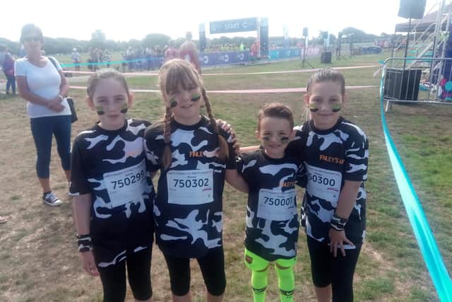 (L-R) Annie Emery, 10, Penny Lewis, 10, Finley Hughes, 7 and Poppy Emery, 8, were running to support Finley's dad who is suffering from bowel cancer.