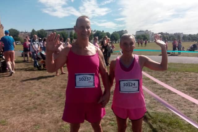 Mike Adams and Sandra Wall were running in memory of Sandra' parents who both died as a result of cancer.