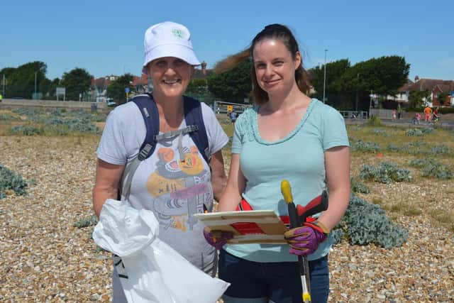 Louise Camden, 60 from Southsea, left, with Mary Smith, 33 from Hilsea at the monthly Southsea beach clean. Picture: David George