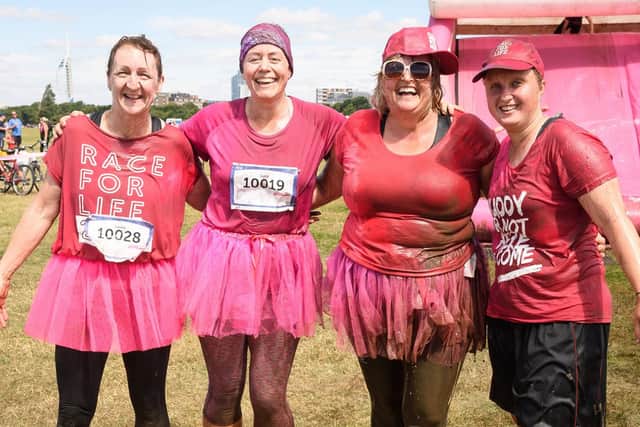 Pictured is:  A group of muddy competitors. Picture: Keith Woodland (060719-268)