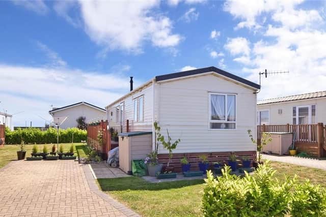 This mobile/ park home which comes with two bedrooms is currently on sale for 50,000. It even has a garden around the property and off road parking. It is listed by Cubitt & West - Portsmouth.