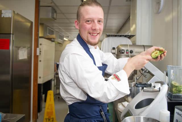 Local chef, Luke Emmess scooping avocado. Picture: Habibur Rahman