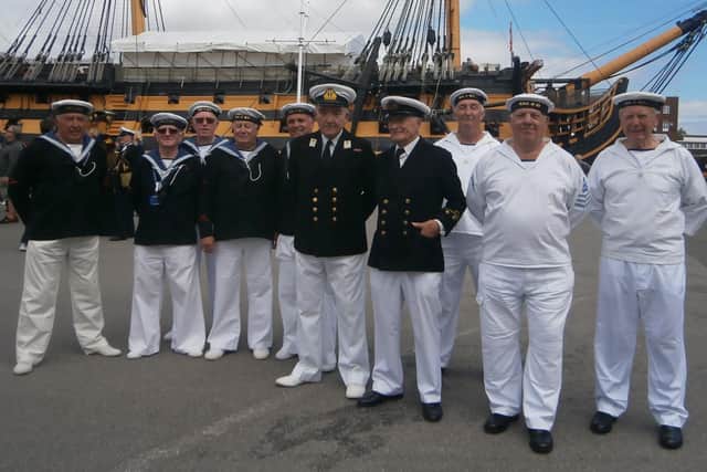 Volunteers in traditional Edwardian naval rig at the historic dockyard. Photo: Martin Marks