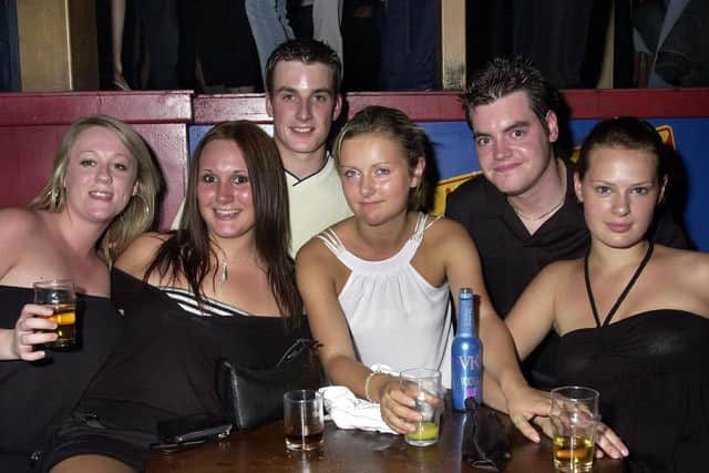 Revellers having a good time at the Route 66 nightclub in Guildhall Walk, Portsmouth - (043813-0008)