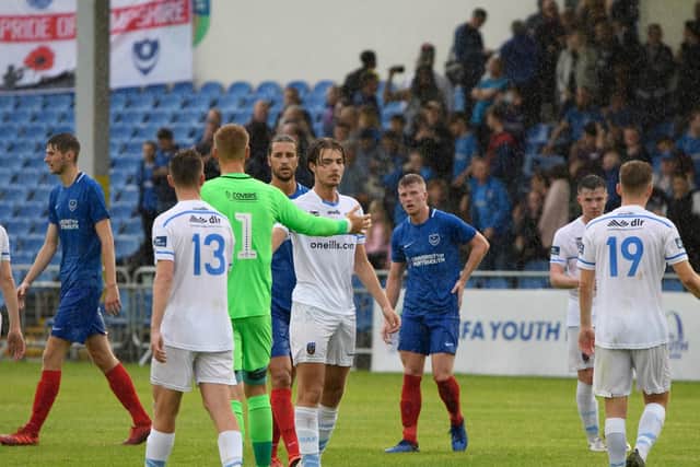 Craig MacGillivray goes to shake a UCD AFC player's hand