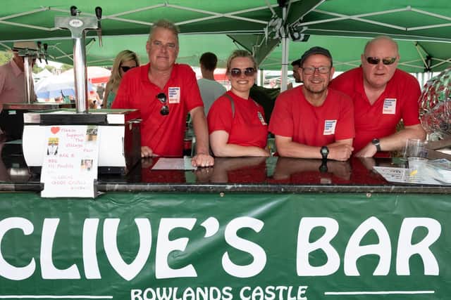 Village Fair Committee members (L-R) Grahame Morrison, Lisa Walker, Ian Oliver and Kevin Miness. Clive's Bar has been named in tribute to a former committee member who passed away last year. Picture: Duncan Shepherd