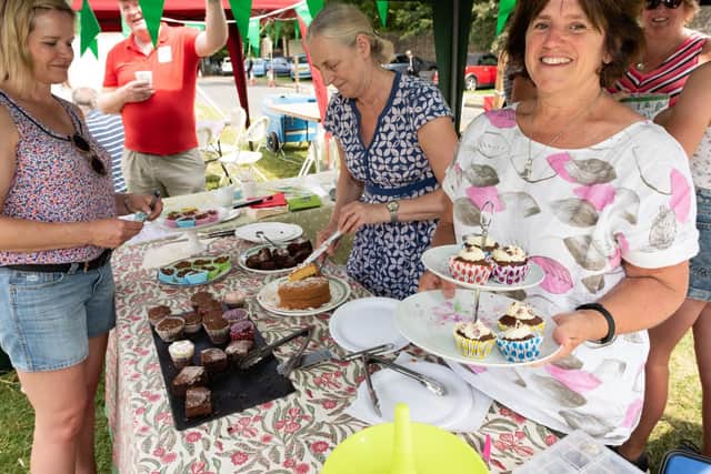 Sue Arnold selling home made cakes raising funds for NSPCC. Picture: Duncan Shepherd