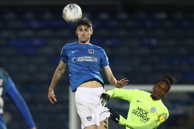 Matt Casey shrugs off Peterborough's Ivan Toney to win a header during Pompey's 1-0 Checkatrade Trophy win in January. Picture: Joe Pepler