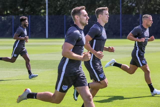 Ex-Dover defender Sean Raggett (centre) is one of six new faces at Fratton Park this summer. Picture: Habibur Rahman