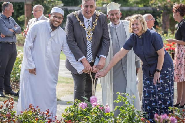 Imam Muhammad Muhi Uddin, Lord Mayor David Fuller, Sheikh Fazle Abbas Datoo and Rev Tracey Ansell planting a rose bush in memory of the victims of Srebrenica. Picture: Habibur Rahman