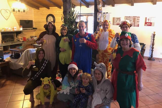 David Cann (centre) on a recent family Christmas skiing trip. Picture: Family handout