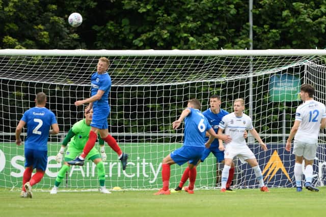 Ross McCrorie heads the ball clear during his first-half outing against UCD. Picture: Arnold Byrne