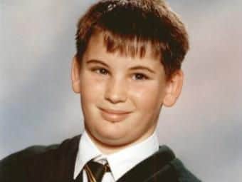 Jason Brown, head of year 11, when he was a pupil at the school.
