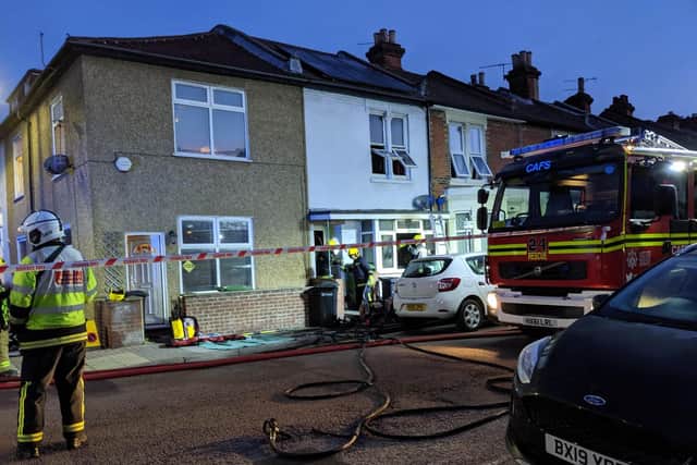Firefighters at the scene in the early hours. Picture: Callum Slater