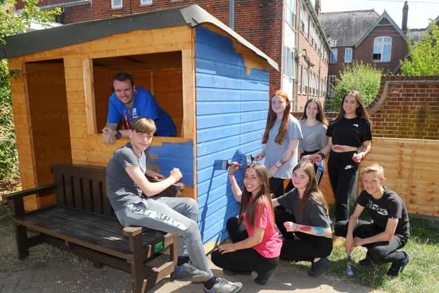 (back l-r) Volunteer it Yourself mentor Dan Munn, Lillie-Rose Vinall (12), Holly Gould (13) and Molly Thomason (13) with (front l-r) Thomas Garrick (13), Tegan Kenna (13), Lucy Drew (13) and George Bannister (13).
Picture: Sarah Standing (120719-946)