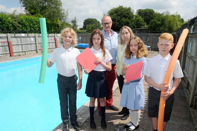 (back l-r) Barry Lamacraft, chair of governors, and Sara Staggs, headteacher, with (front l-r) Daniel Jones (11), Anna Keefe (9), Francesa Ellis (10) and Oliver Meadows (11).
Picture: Sarah Standing (160719-1314)