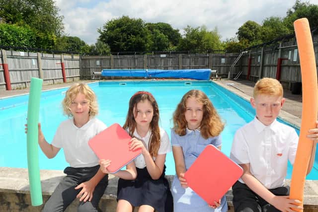 (l-r) Daniel Jones (11), Anna Keefe (9), Francesa Ellis (10) and Oliver Meadows (11) are taking part in a sponsored swim to raise money to save the school's pool.
Picture: Sarah Standing (160719-1374)