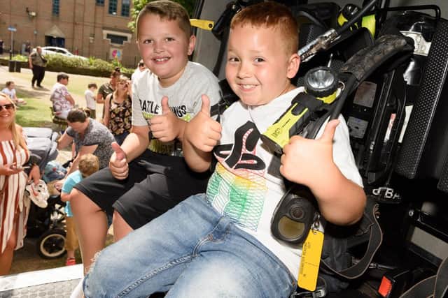 Possibly future firefighters(L-R) Lennon Warwick (8yrs) and Jack Taylor (8yrs). Picture: Duncan Shepherd