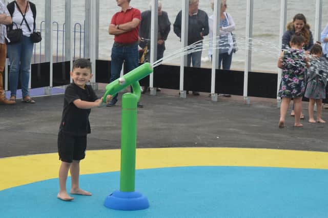 Jackson Francis (3) on the splash park's water cannon. Picture: David George