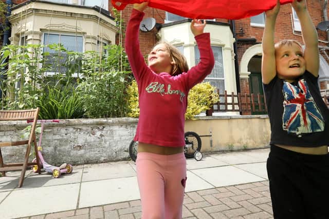 Lillie Rogers, 8, and Blaze Rogers, 6 as Francis Avenue, Portsmouth, became a play street. Picture: Chris Moorhouse (210719-56)