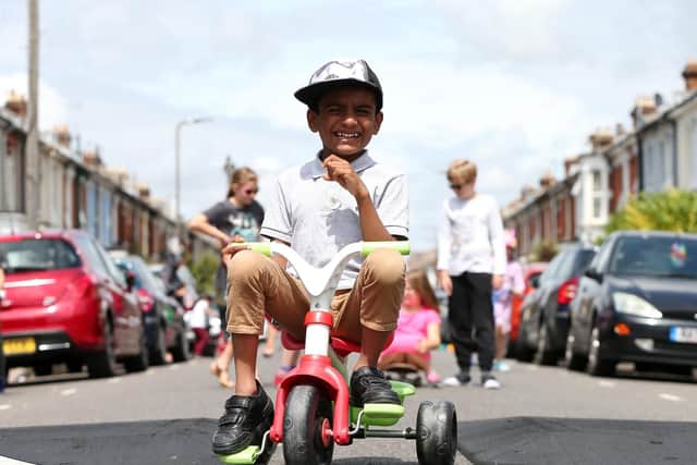 Osman Alam, 6, as Francis Avenue, Portsmouth, became a play street. Picture: Chris Moorhouse (210719-60)