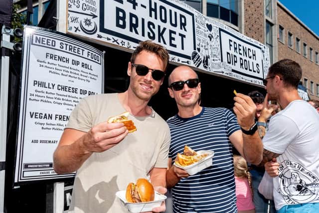 Tony MacSwayne and Joe Conway with their 24 Hour Brisket Rolls. (200719-014)