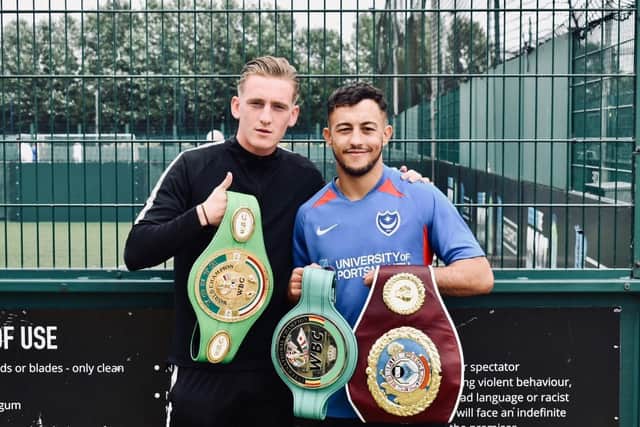 Mikey McKinson visited Pompey's training ground after his win on Saturday - here he is with Ronan Curtis . Picture: Portsmouth FC
