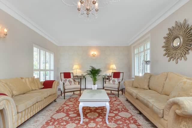 It has a heated swimming pool and summer house and four reception areas. It is listed by Fine and Country.